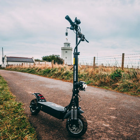 Electric scooter on a private path near the coast